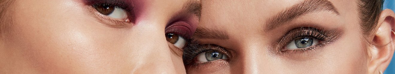 ภาพแบนเนอร์ประกอบผลิตภัณฑ์เมคอัพสำหรับดวงตาของเมย์เบลลีน - ภาพระยะใกล้ของโมเดลที่ทาอายแชโดว์สองคน